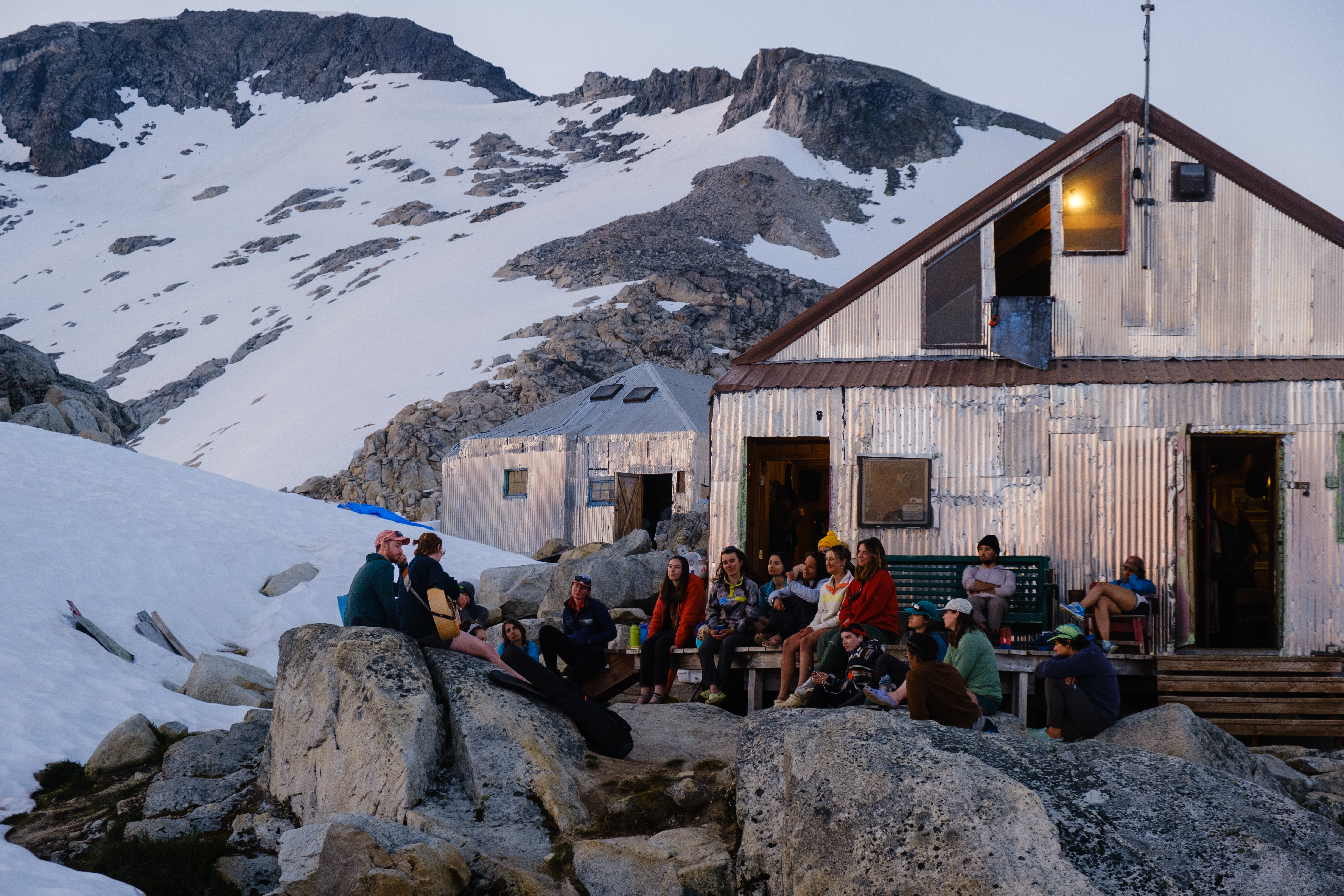 Students and staff members in front of the cooking shack of Camp 10.